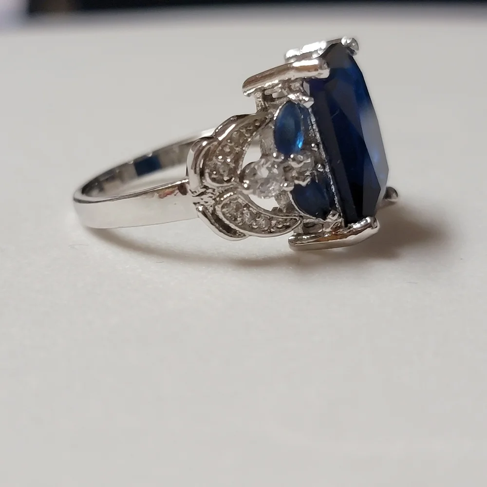 Simulated Sapphire Silver Tone Cocktail Ring Angel Wings and Marquise Stones